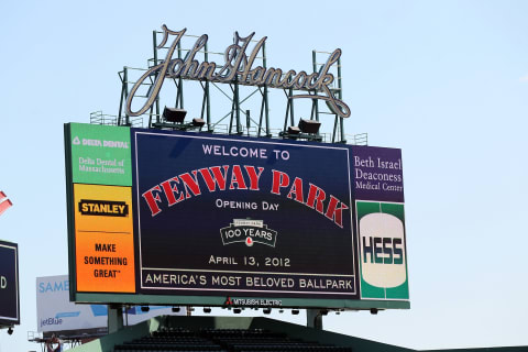 BOSTON, MA – APRIL 13: General view of the bleacher seats scoreboard before the game between the Boston Red Sox and the Tampa Bay Rays during the home opener on April 13, 2012 at Fenway Park in Boston, Massachusetts. (Photo by Elsa/Getty Images)