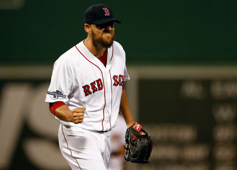 BOSTON, MA – OCTOBER 05: John Lackey #41 of the Boston Red Sox reacts in the fifth inning against the Tampa Bay Rays during Game Two of the American League Division Series at Fenway Park on October 5, 2013 in Boston, Massachusetts. (Photo by Jim Rogash/Getty Images)