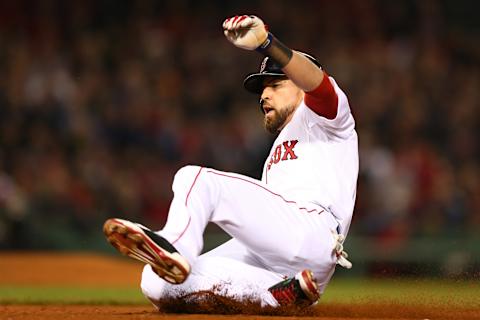 BOSTON, MA – OCTOBER 30: Jacoby Ellsbury #2 of the Boston Red Sox slides into first base after a rundown against the St. Louis Cardinals during Game Six of the 2013 World Series at Fenway Park on October 30, 2013 in Boston, Massachusetts. (Photo by Elsa/Getty Images)