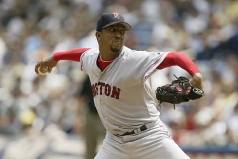 BRONX, NY – JULY 7: Starting pitcher Pedro Martinez #45 the Boston Red Sox pitches against the New York Yankees during the MLB game at Yankee Stadium on July 7, 2003 in Bronx, New York. The Yankees defeated the Red Sox 2-1. (Photo by Ezra Shaw/Getty Images)