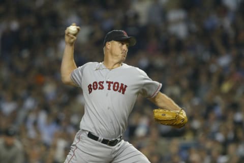 BRONX, NY – OCTOBER 8: Pitcher Mike Timlin #50 of the Boston Red Sox pitches against the New York Yankees during game 1 of the American League Championship Series on October 8, 2003 at Yankee Stadium in the Bronx, New York. The Red Sox won 5-2. (Photo by Doug Pensinger/Getty Images)