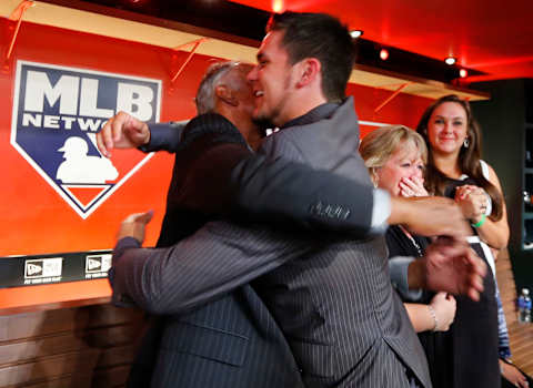 SECAUCUS, NJ – JUNE 5: Michael Chavis hugs his family after being chosen 26th overall by the Boston Red Sox during the MLB First-Year Player Draft at the MLB Network Studio on June 5, 2014 in Secacucus, New Jersey. (Photo by Rich Schultz/Getty Images)