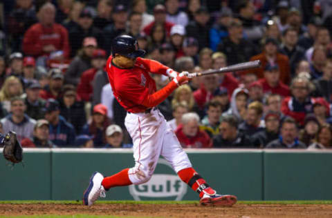 BOSTON, MA – MAY 12: Mookie Betts #50 of the Boston Red Sox hits a foul ball during the sixth inning of a game against the Tampa Bay Rays at Fenway Park on May 12, 2017 in Boston, Massachusetts. The Rays won 5-4. (Photo by Rich Gagnon/Getty Images)