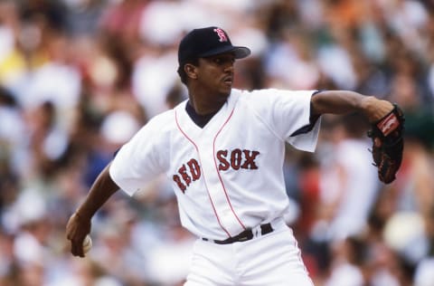 BOSTON, MA – SEPTEMBER 2000: Pedro Martinez #45 of the Boston Red Sox pitching to the New York Yankees in Fenway Park in September 2000 in Boston, Massachusetts. (Photo by Ronald C. Modra/Getty Images)