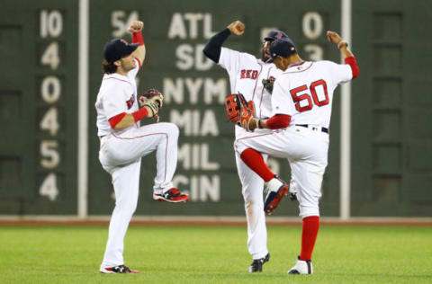 BOSTON, MA – JUNE 29: Andrew Benintendi #16, Jackie Bradley Jr. #19 and Mookie Betts #50 of the Boston Red Sox reacts after the victory over the Minnesota Twins at Fenway Park on June 29, 2017 in Boston, Massachusetts. (Photo by Adam Glanzman/Getty Images)