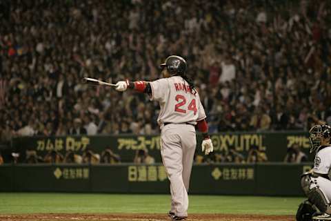 TOKYO – MARCH 26: Manny Ramirez of the Boston Red Sox hits a home run (Photo by Michael Zagaris/MLB Photos via Getty Images)