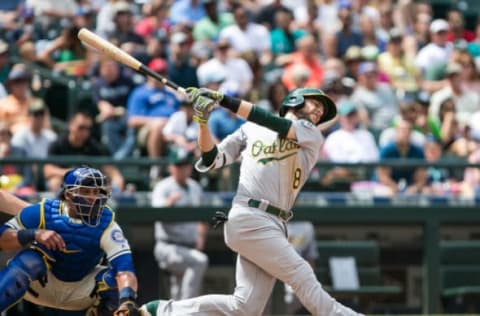 SEATTLE, WA – JULY 09: Jed Lowrie #8 of the Oakland Athletics swings hard at a pitch during his strikeout in the sixth inning against Felix Hernandez #34 of the Seattle Mariners at Safeco Field on July 9, 2017 in Seattle, Washington. (Photo by Lindsey Wasson/Getty Images)