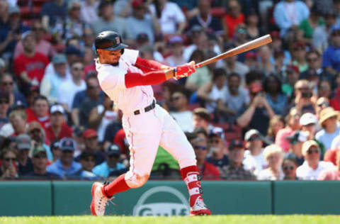 BOSTON, MA – MAY 02: Mookie Betts #50 of the Boston Red Sox hits a solo home run during the seventh inning against the Kansas City Royals at Fenway Park on May 2, 2018 in Boston, Massachusetts. (Photo by Tim Bradbury/Getty Images)