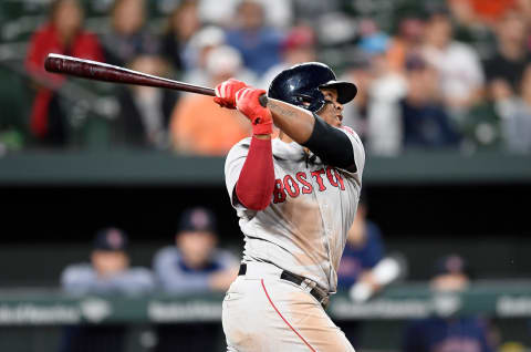 BALTIMORE, MD – JUNE 11: Rafael Devers #11 of the Boston Red Sox hits a double in the 12th inning against the Baltimore Orioles at Oriole Park at Camden Yards on June 11, 2018 in Baltimore, Maryland. (Photo by Greg Fiume/Getty Images)