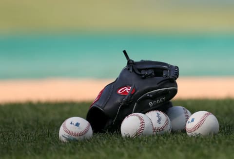 PHILADELPHIA, PA – JUNE 29: A glove and balls sit on the infield before a game between the Washington Nationals and Philadelphia Phillies at Citizens Bank Park on June 29, 2018 in Philadelphia, Pennsylvania. (Photo by Rich Schultz/Getty Images)