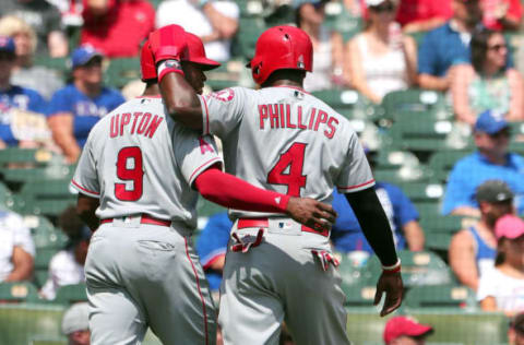 ARLINGTON, TX – SEPTEMBER 03: Justin Upton and Brandon Phillips (Photo by Richard W. Rodriguez/Getty Images)