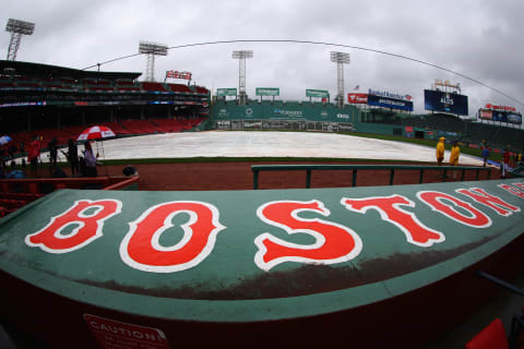 BOSTON, MA – OCTOBER 09: Rain drops are seen on the Boston Red Sox dugout. (Photo by Tim Bradbury/Getty Images)