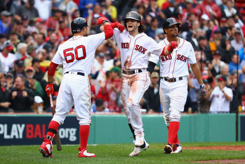 BOSTON, MA – OCTOBER 09: Andrew Benintendi #16 of the Boston Red Sox celebrates with Mookie Betts #50 after hitting a two-run home run in the fifth inning against the Houston Astros during game four of the American League Division Series at Fenway Park on October 9, 2017 in Boston, Massachusetts. (Photo by Maddie Meyer/Getty Images)