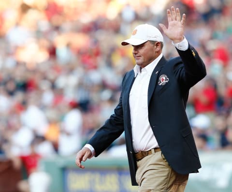 BOSTON, MA – AUGUST 14: Former Boston Red Sox pitcher Roger Clemens walks on the field after being inducted into the Red Sox Hall of Fame before a game between the Red Sox and the Houston Astros at Fenway Park on August 14, 2014 in Boston, Massachusetts. (Photo by Jim Rogash/Getty Images)