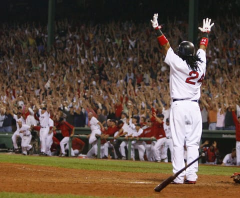 BOSTON – OCTOBER 5: Manny Ramirez #24 of the Boston Red Sox celebrates after connecting for a three-run home run to defeat the Los Angeles Angels, 6-3, in Game 2 of the American League Division Series at Fenway Park October 5, 2007 in Boston, Massachusetts. (Photo by Jim Rogash/Getty Images)