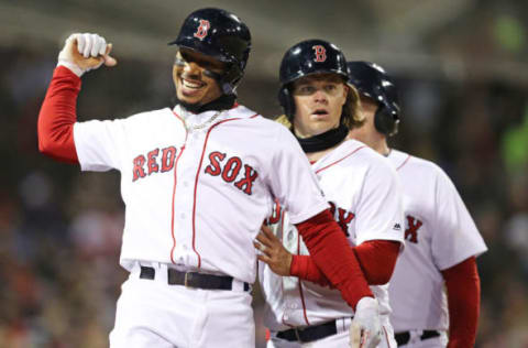 BOSTON, MA – APRIL 10: Mookie Betts #50 of the Boston Red Sox celebrates with Brock Holt #12 after hitting a grand slam during the sixth inning against the New York Yankees at Fenway Park on April 10, 2018 in Boston, Massachusetts. (Photo by Maddie Meyer/Getty Images)