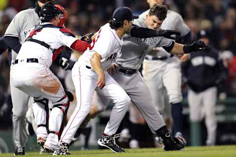 BOSTON, MA – April 11: Tyler Austin #26 of the New York Yankees fights Joe Kelly #56 of the Boston Red Sox after being struck by a pitch Kelly threw during the seventh inning at Fenway Park on April 11, 2018, in Boston, Massachusetts. (Photo by Maddie Meyer/Getty Images)