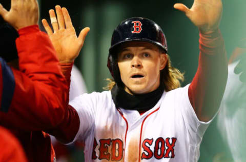 BOSTON, MA – APRIL 12: Brock Holt #12 of the Boston Red Sox returns to the dugout after scoring in the second inning of a game against the New York Yankees at Fenway Park on April 12, 2018 in Boston, Massachusetts. (Photo by Adam Glanzman/Getty Images)