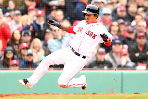 BOSTON, MA – APRIL 14: Tzu-Wei Lin #5 of the Boston Red Sox slides safely in to home plate in the fourth inning of a game against the Baltimore Orioles at Fenway Park on April 14, 2018 in Boston, Massachusetts. (Photo by Adam Glanzman/Getty Images)