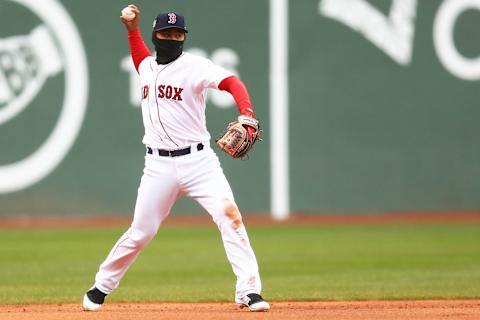 BOSTON, MA – APRIL 15: Tzu-Wei Lin #5 of the Boston Red Sox throws to first base in the first inning of a game against the Baltimore Orioles at Fenway Park on April 15, 2018 in Boston, Massachusetts. All players are wearing #42 in honor of Jackie Robinson Day. (Photo by Adam Glanzman/Getty Images)