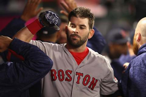 ANAHEIM, CA – APRIL 18: Mitch Moreland #18 of the Boston Red Sox is congratulated in the dugout after hitting a two-run homerun during the ninth inning of a game against the Los Angeles Angels of Anaheim at Angel Stadium on April 18, 2018 in Anaheim, California. (Photo by Sean M. Haffey/Getty Images)