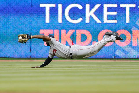 MIAMI, FL – APRIL 03: Jackie Bradley Jr. #19 of the Boston Red Sox makes a diving catch during the second inning against the Miami Marlins at Marlins Park on April 3, 2018 in Miami, Florida. (Photo by Michael Reaves/Getty Images)