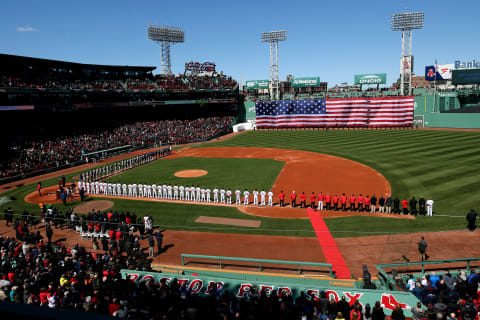 BOSTON, MA – APRIL 05: Members of the Boston Red Sox and the Tampa Bay Rays stand for the national anthem before the Red Sox home opening game at Fenway Park on April 5, 2018 in Boston, Massachusetts. (Photo by Maddie Meyer/Getty Images)