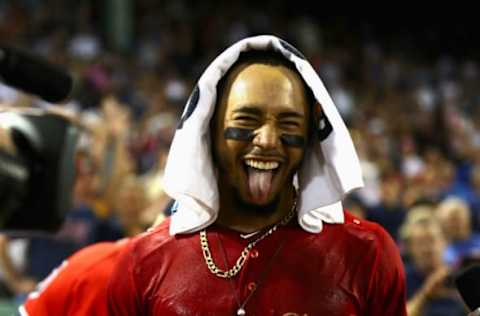 BOSTON, MA – JULY 27: Mookie Betts #50 of the Boston Red Sox celebrates after hitting a walk off homer in the bottom of the tenth inning of the game against the Minnesota Twins at Fenway Park on July 27, 2018 in Boston, Massachusetts. (Photo by Omar Rawlings/Getty Images)