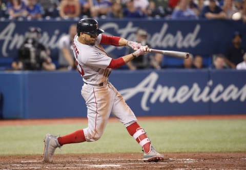 TORONTO, ON – AUGUST 9: Mookie Betts #50 of the Boston Red Sox hits a solo home run to complete the cycle in the ninth inning during MLB game action against the Toronto Blue Jays at Rogers Centre on August 9, 2018 in Toronto, Canada. (Photo by Tom Szczerbowski/Getty Images)