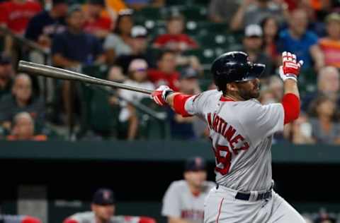 BALTIMORE, MD – AUGUST 11: J.D. Martinez #28 of the Boston Red Sox hits a two-run home run in the eighth inning against the Baltimore Orioles during game two of a doubleheader at Oriole Park at Camden Yards on August 11, 2018 in Baltimore, Maryland. (Photo by Patrick McDermott/Getty Images)