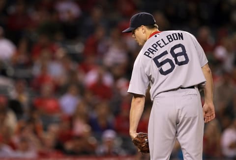 ANAHEIM, CA – JULY 27: Closer Jonathan Paplebon #58 of the Boston Red Sox sets to deliver a pitch on his way to picking up the save against the Los Angeles Angels of Anaheim on July 27, 2010 at Angel Stadium in Anaheim, California. The Red Sox won 4-2. (Photo by Stephen Dunn/Getty Images)