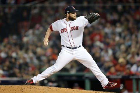 BOSTON, MA – OCTOBER 14: Ryan Brasier #70 of the Boston Red Sox delivers the pitch during the seventh inning against the Houston Astros in Game Two of the American League Championship Series at Fenway Park on October 14, 2018 in Boston, Massachusetts. (Photo by Elsa/Getty Images)