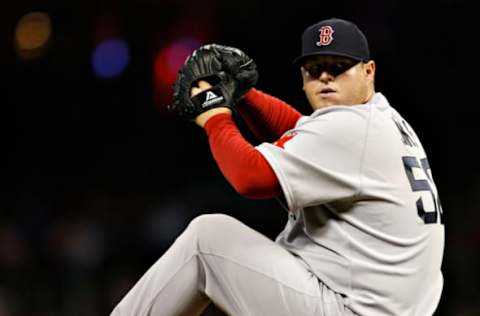 HOUSTON – JULY 02: Pitcher Bobby Jenks #52 throws in the eighth inning against the Houston Astros at Minute Maid Park on July 2, 2011 in Houston, Texas. Boston won 10-4. (Photo by Bob Levey/Getty Images)