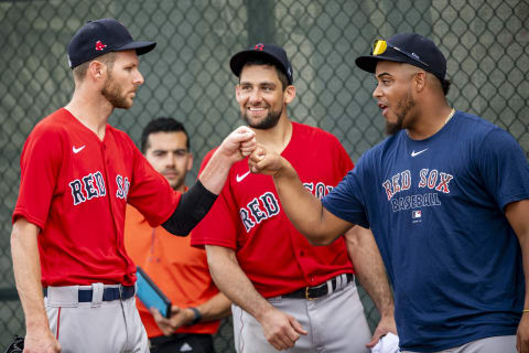 FT. MYERS, FL – FEBRUARY 20: Chris Sale #41 of the Boston Red Sox high fives Nathan Eovaldi #17 and Darwinzon Hernandez #63 during a team workout on February 20, 2020 at jetBlue Park at Fenway South in Fort Myers, Florida. (Photo by Billie Weiss/Boston Red Sox/Getty Images)