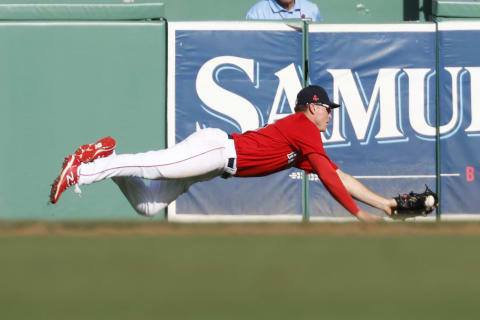 FORT MYERS, FL – FEBRUARY 22: Tyler Esplin #30 of the Boston Red Sox makes a diving catch on the ball hit by Vidal Brujan #22 of the Tampa Bay Rays for the final out of the game on February 22, 2020 at JetBlue Park in Fort Myers, Florida. The Red Sox defeated the Rays 4-3. (Photo by Joel Auerbach/Getty Images)