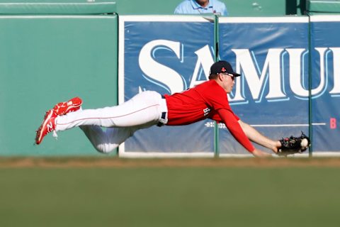 FORT MYERS, FL – FEBRUARY 22: Tyler Esplin #30 of the Boston Red Sox makes a diving catch on the ball hit by Vidal Brujan #22 of the Tampa Bay Rays for the final out of the game on February 22, 2020 at JetBlue Park in Fort Myers, Florida. The Red Sox defeated the Rays 4-3. (Photo by Joel Auerbach/Getty Images)