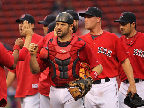 BOSTON, MA – AUGUST 27: Jason Varitek #33 of the Boston Red Sox and Michael Bowden #64 of the Boston Red Sox celebrate their 9-3 win over the Oakland Athletics at Fenway Park August 27, 2011 in Boston, Massachusetts. (Photo by Jim Rogash/Getty Images)