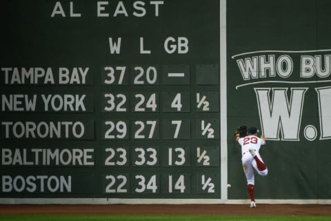 BOSTON, MA – SEPTEMBER 24: Michael Chavis #23 of the Boston Red Sox is unable to make a catch at the Green Monster in the fourth inning against the Boston Red Sox at Fenway Park on September 24, 2020 in Boston, Massachusetts. (Photo by Kathryn Riley/Getty Images)