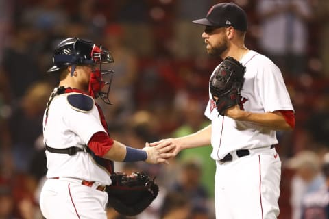 BOSTON, MA – AUGUST 26: Matt Barnes #32 reacts with Christian Vazquez #7 of the Boston Red Sox after a victory over the Minnesota Twins at Fenway Park on August 26, 2021 in Boston, Massachusetts. (Photo by Adam Glanzman/Getty Images)