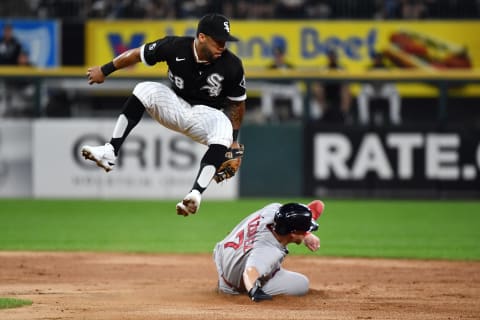 CHICAGO, IL – SEPTEMBER 10: Leury García #28 of the Chicago White Sox leaps and looks back at the ball that was overthrown as Christian Vázquez #7 of the Boston Red Sox steals second base in the third inning at Guaranteed Rate Field on September 10, 2021 in Chicago, Illinois. (Photo by Jamie Sabau/Getty Images)