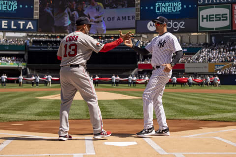 NEW YORK, NY – APRIL 8: Manager Alex Cora of the Boston Red Sox shakes hands with Manager Aaron Boone of the New York Yankees before the 2022 Major League Baseball Opening Day game on April 8, 2022 at Yankee Stadium in the Bronx borough of New York City. (Photo by Billie Weiss/Boston Red Sox/Getty Images)