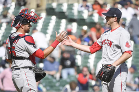 DETROIT, MICHIGAN – APRIL 12: Kevin Plawecki #25 of the Boston Red Sox high fives Garrett Whitlock #72 of the Boston Red Sox after winning the game against the Detroit Tigers at Comerica Park on April 12, 2022 in Detroit, Michigan. (Photo by Nic Antaya/Getty Images)