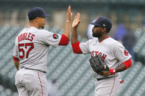 DETROIT, MI – APRIL 13: Pitcher Hansel Robles #57 of the Boston Red Sox celebrates with Jackie Bradley Jr. #19 after a 9-7 win over the Detroit Tigers at Comerica Park on April 13, 2022, in Detroit, Michigan. (Photo by Duane Burleson/Getty Images)