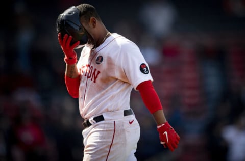 BOSTON, MA - APRIL 18: Rafael Devers #11 of the Boston Red Sox reacts after hitting a pop out during the ninth inning of a game against the Minnesota Twins on April 18, 2022 at Fenway Park in Boston, Massachusetts. (Photo by Maddie Malhotra/Boston Red Sox/Getty Images)