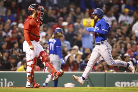 BOSTON, MA – APRIL 20: Santiago Espinal #5 of the Toronto Blue Jays scorers in the second inning of a game against the Boston Red Sox at Fenway Park on April 20, 2022 in Boston, Massachusetts. (Photo by Adam Glanzman/Getty Images)