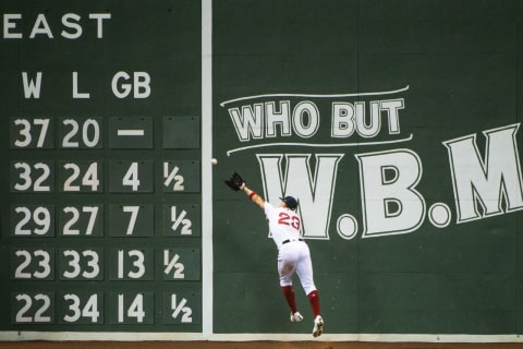 BOSTON, MA – SEPTEMBER 24: Michael Chavis #23 of the Boston Red Sox is unable to make a catch at the Green Monster wall in the fourth inning against the Baltimore Orioles at Fenway Park on September 24, 2020 in Boston, Massachusetts. (Photo by Kathryn Riley/Getty Images)