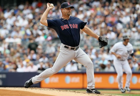 NEW YORK, NY – SEPTEMBER 25: (NEW YORK DAILIES OUT) Tim Wakefield #49 of the Boston Red Sox in action against the New York Yankees at Yankee Stadium on September 25, 2011 in the Bronx borough of New York City. The Yankees defeated the Red Sox 6-2. (Photo by Jim McIsaac/Getty Images)