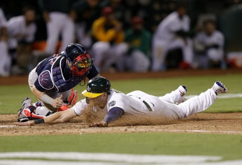 OAKLAND, CALIFORNIA – JULY 02: Seth Brown #15 of the Oakland Athletics is tagged out by Christian Vazquez #7 of the Boston Red Sox in the tenth inning at RingCentral Coliseum on July 02, 2021 in Oakland, California. (Photo by Ezra Shaw/Getty Images)