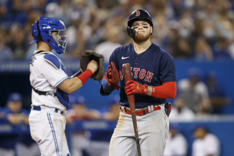 TORONTO, ON – AUGUST 07: Alex Verdugo #99 of the Boston Red Sox walks back to the dugout in the eighth inning of Game Two of the doubleheader MLB game against the Toronto Blue Jays at Rogers Centre on August 7, 2021 in Toronto, Ontario. (Photo by Cole Burston/Getty Images)