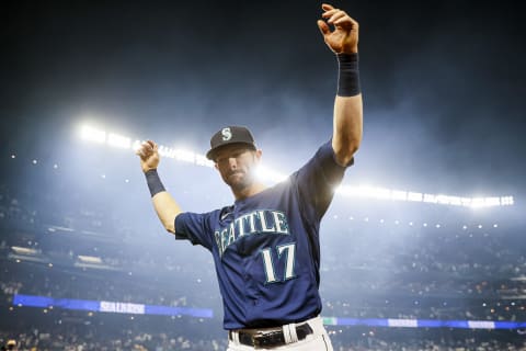 SEATTLE, WASHINGTON – OCTOBER 02: Mitch Haniger #17 of the Seattle Mariners reacts after beating the Los Angeles Angels 6-4 at T-Mobile Park on October 02, 2021 in Seattle, Washington. (Photo by Steph Chambers/Getty Images)